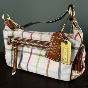 Coach limited edition tattersall legacy pouch. Like new.